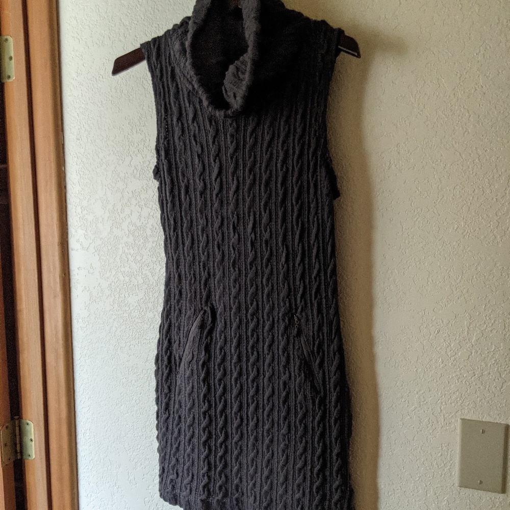 Cable-knit charcoal + zip pockets; Cotton blend